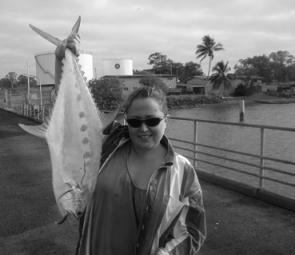 Jasmine Jones with a small lure caught queenfish.